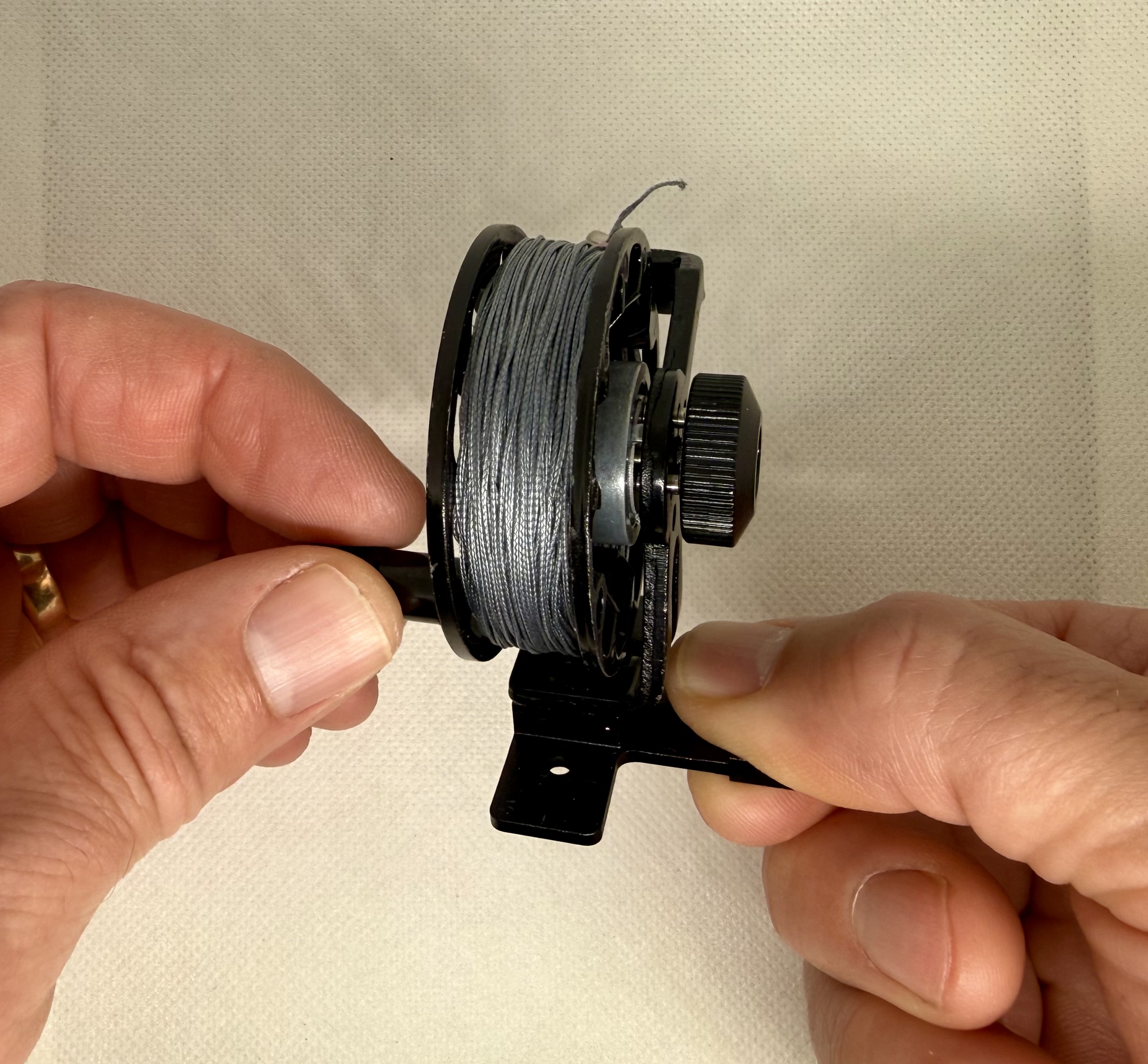 Reusable metal trip wire reel with 100ft kevlar line - Image 4